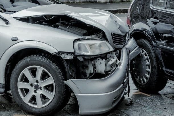 one car rear ending another on a rainy day.2008261514550